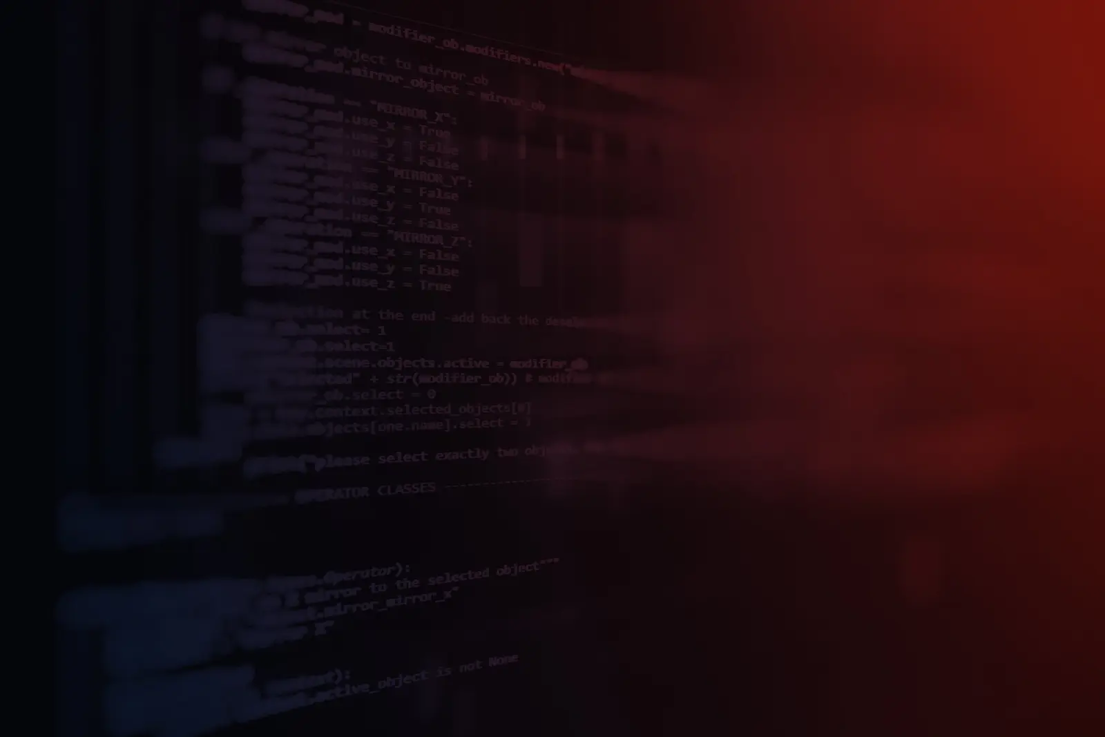 Computer screen displaying lines of programming code, dimly lit with a dark red glow.