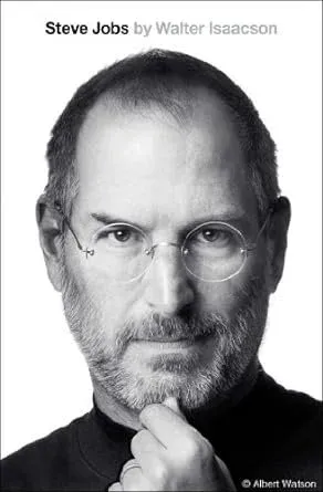 Book cover of "Steve Jobs by Walter Isaacson" with a black-and-white portrait of a bearded man in round glasses, hand to chin.