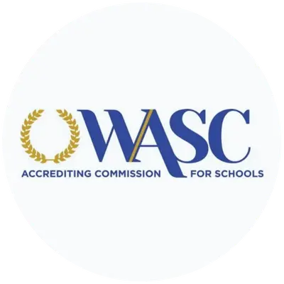WASC logo with gold laurel wreath and text "Accrediting Commission for Schools"