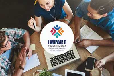 Four students meet around a table with laptop and notebooks, overlaid with the "Impact Change Makers" logo.