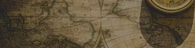 Antique sepia-toned world map with a brass compass resting in the upper right corner.